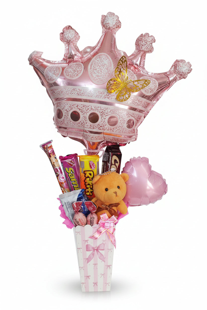 Arreglo de globos corona rosa con golosinas, mini peluche y caja decorativa – vista frontal